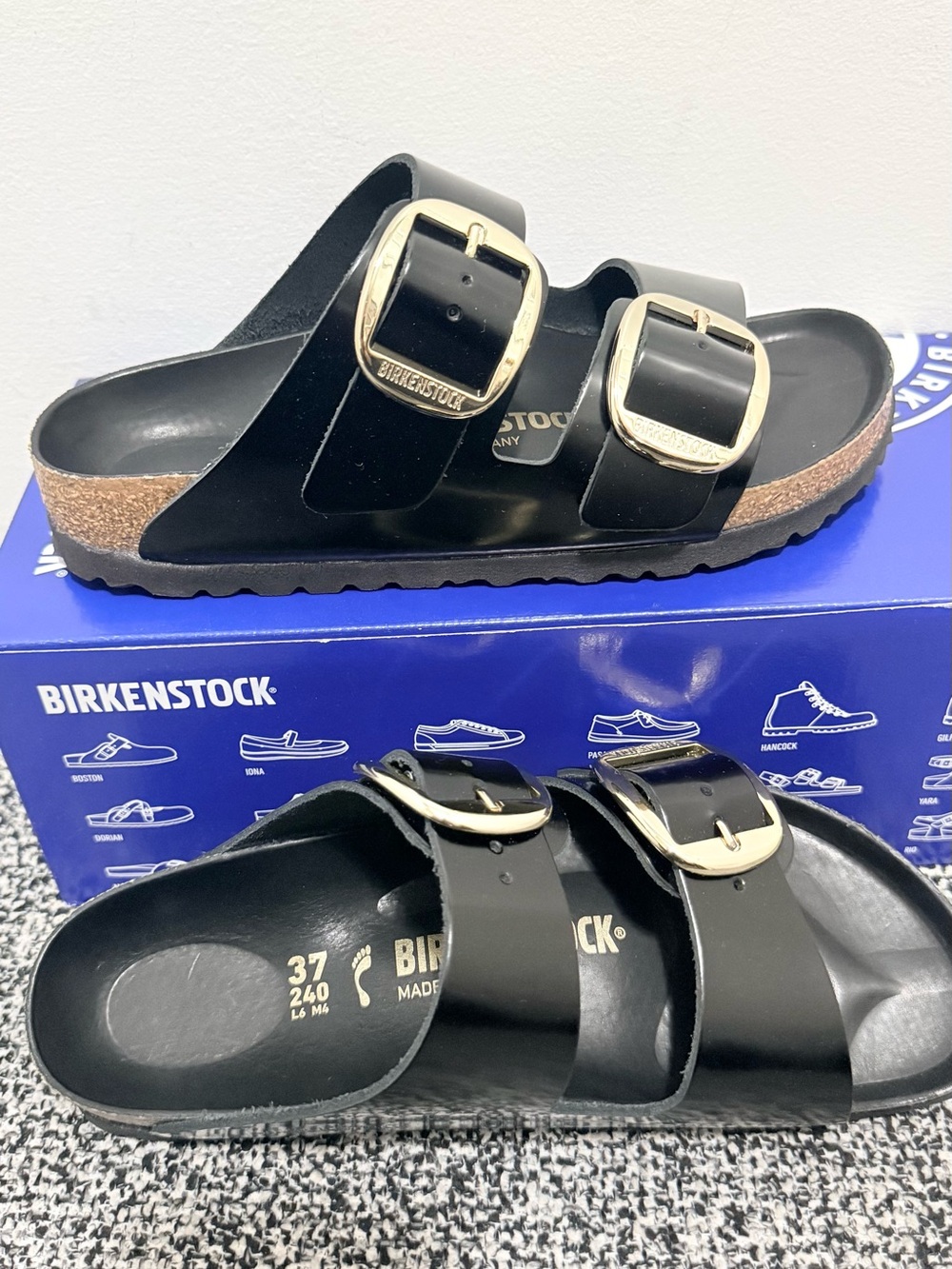Birkenstock Black Arizona Glossy Two-Strap Sandals with Gold Buckles